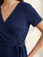 navy V-neck long sleeve wrap midi dress with adjustable tie waist — detail view