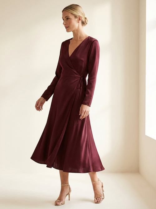 deep burgundy satin-touch wrap midi dress with subtle luminous sheen — angle view