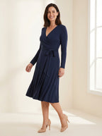 navy V-neck long sleeve wrap midi dress with adjustable tie waist — angle view