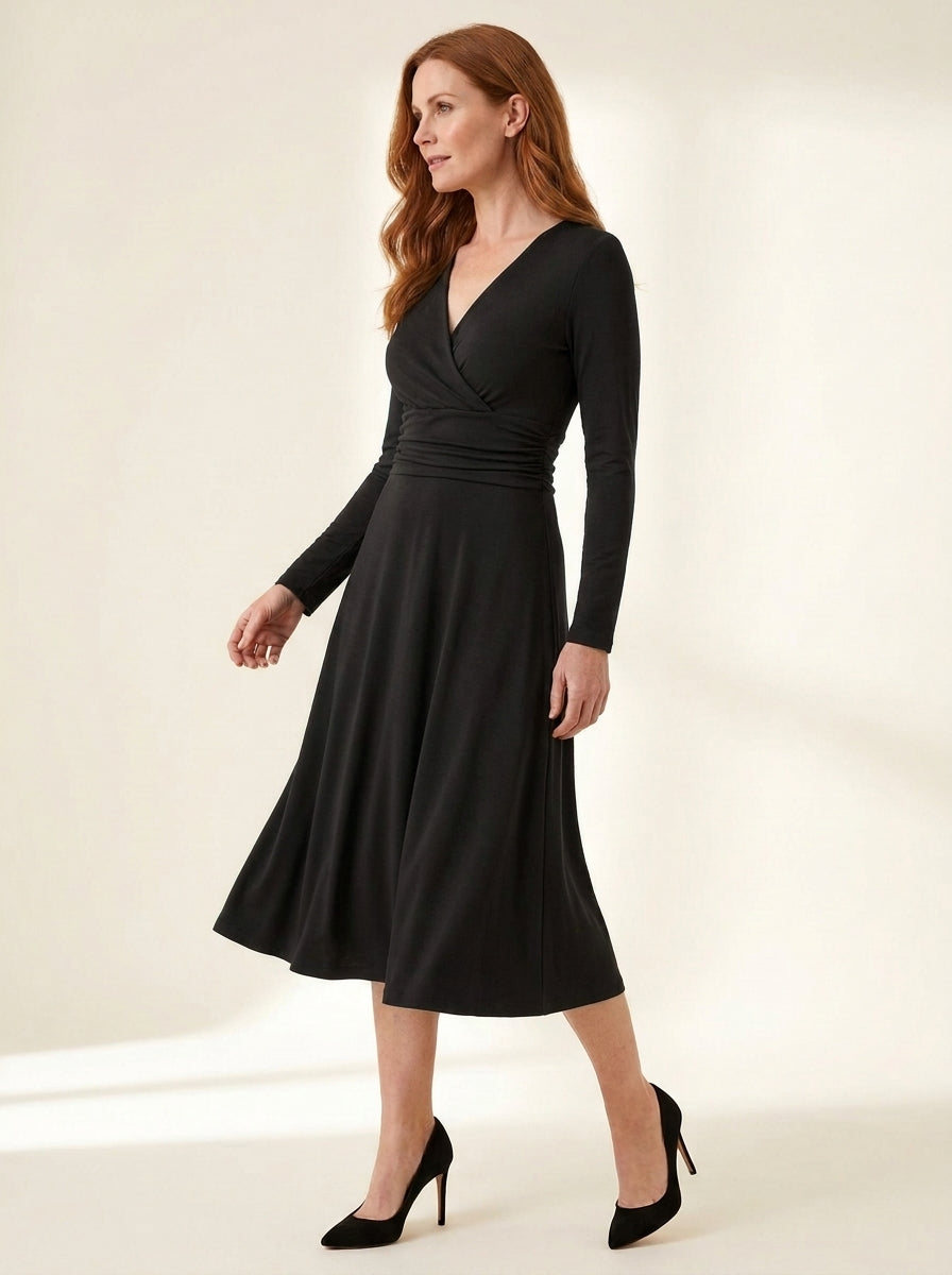 Ruched-Waist Long Sleeve Midi Dress in Black — angle view