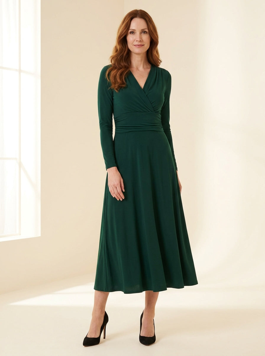 emerald green long sleeve midi dress with softly ruched waist — front view