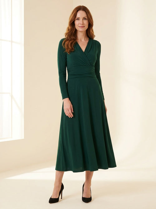 emerald green long sleeve midi dress with softly ruched waist — front view
