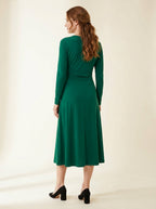 emerald green long sleeve midi dress with softly ruched waist — back view